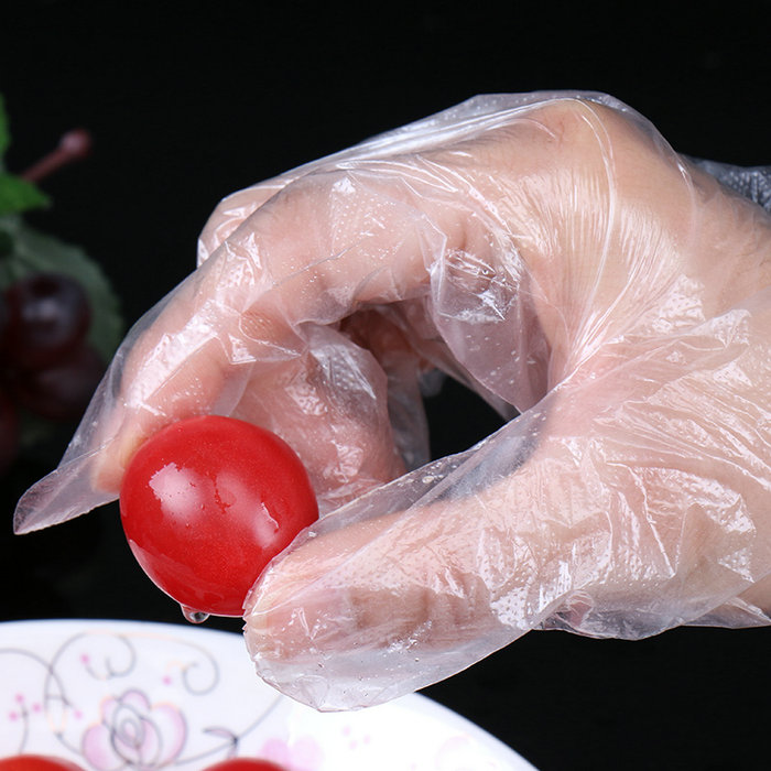 Disposable food grade plastic gloves with hanging hole 